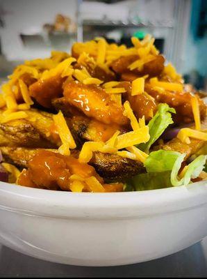 Breaded Chicken Salad, tossed in your choice of sauce and choice of our homemade dressings. Pictured is tossed in our hot sauce.