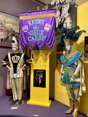 Krewe du Vieux exhibit with parade costumes - New Orleans Mardi Gras REX Exhibition