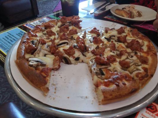 Our delicious sausage and mushroom pizza