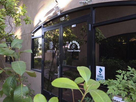 Front door entrance in a serene setting