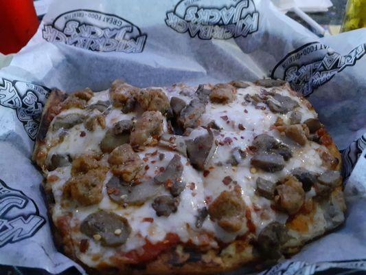 Mushrooms and Italian sausage flatbread.