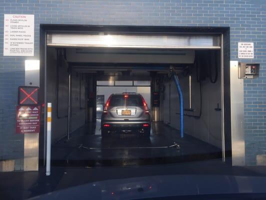 One of the two touch less car wash tunnels. Open 24/7.