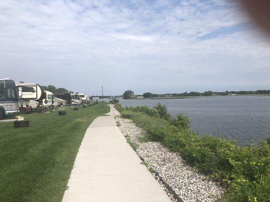 Walking path parallel to the resort and the river