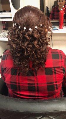 This is one of our hairdos. She is now ready for a wedding.