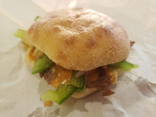 Steak and cheese slider.  Their new tiny sandwiches.  A nice snack!