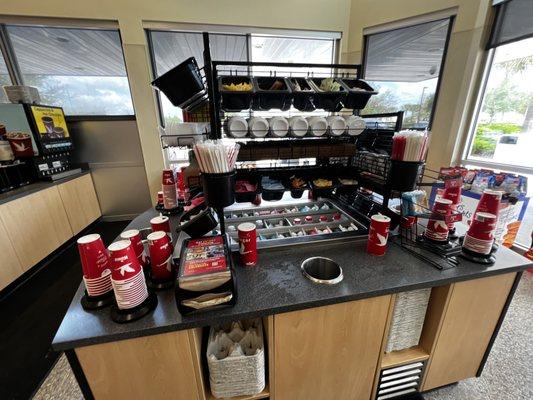 What an amazing coffee prep station. All the creamer options even plant based milk.