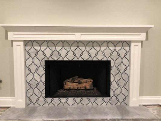 New mantle with marble tile hearth