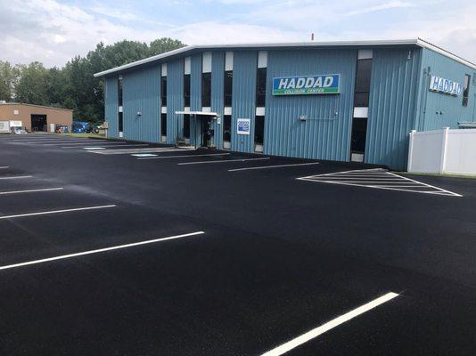 Check out our new freshly paved and lined parking lot!