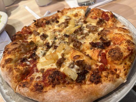 Sausage, bacon & pineapple pizza