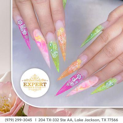 Step into holiday with vibrant floral nail art! Blossom your fingertips with colorful petals for a fresh look.