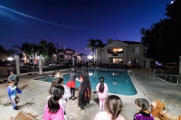 hanging out poolside during our resident Halloween party