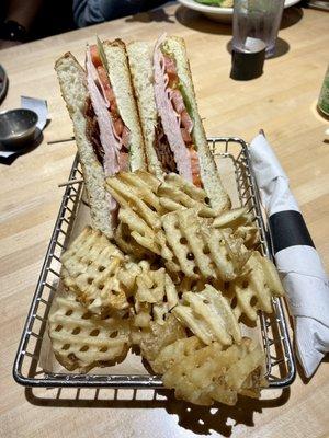 Club sandwich and waffle fries