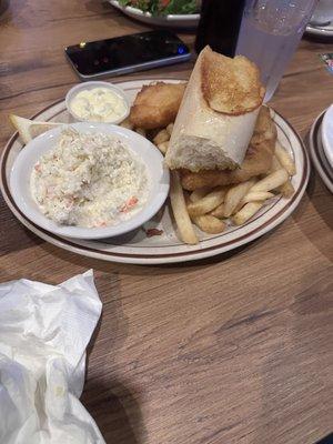 Coleslaw, fish and chips with toasted bread