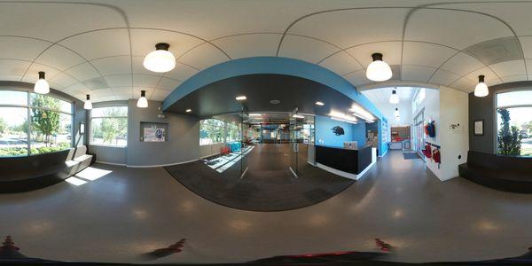 Entryway looking into gym and down hallway to childcare room.