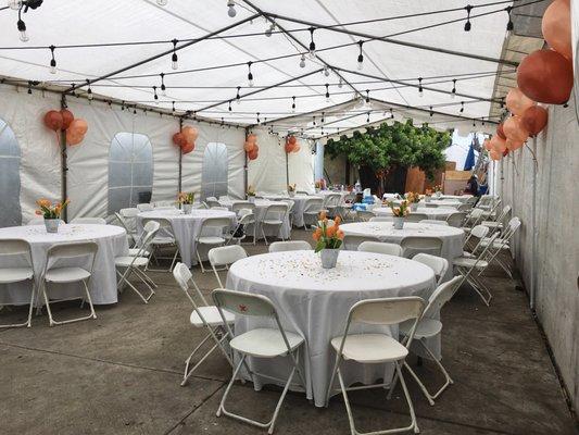 Tents, tables, linens, and chairs. We added our own lights for ambiance, but they provide lighting too.