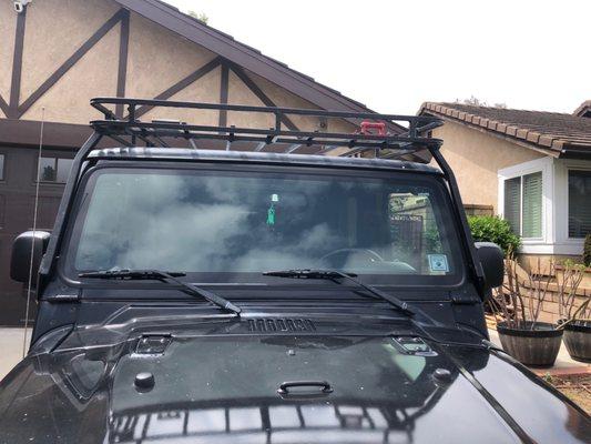 Jeep windshield repair for wind noise.