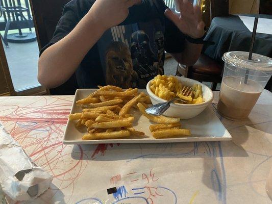 Our son enjoyed the kids Mac and cheese with crispy fries and a chocolate milk. They have paper on the tables and crayons to pass the time.