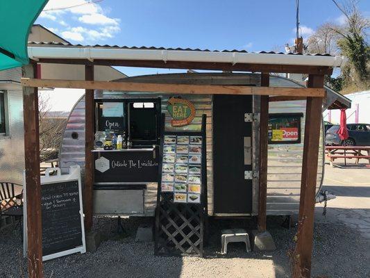 The airstream trailer toward the back, right by J Vein Caffé, my favorite coffee spot!