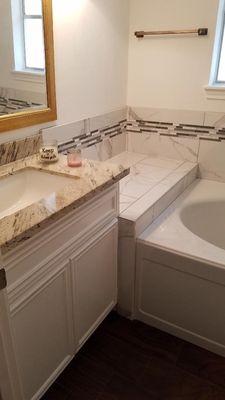 Guest Bath with Custom Built Vanity, Granite and Tile Surround Bath