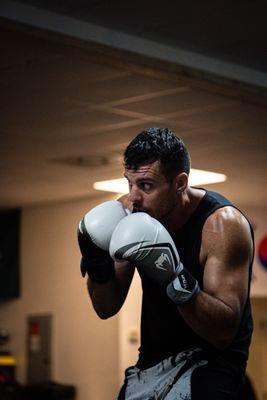 Member working on boxing.