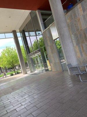 Enter the building that says City Hall.