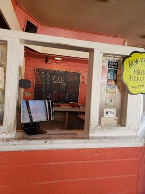 One menu. They take plastic. Extra items posted on the high counter wall. Smells like a good BBQ joint.