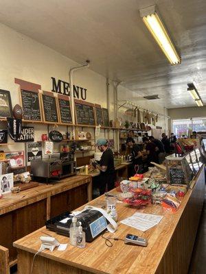 Delicious deli sandwiches being made by food artists