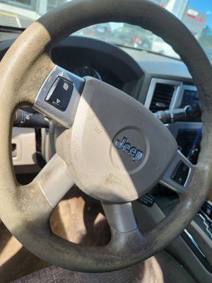 Mechanically stripped the steering wheel of texture without authorization.