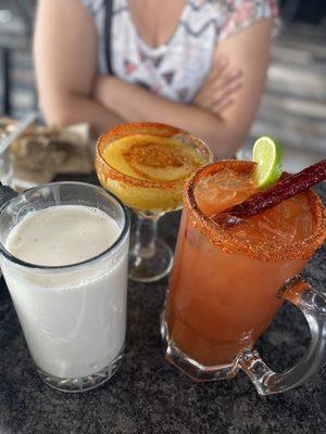 Mango margarita, horchata, and the michelada with a shot I got the michelada with a shot , I forgot what it's called.