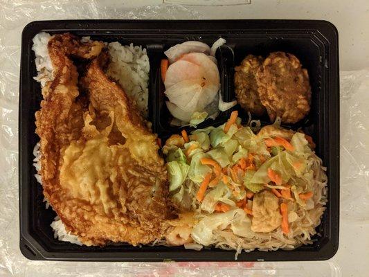 Filipino bento box: fried fish, pancit, fish fritters, pickled veg; satisfies a fix