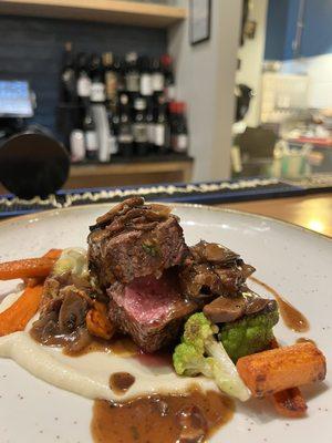 Prime filet. Cauliflower purée. Braised carrots. Black truffle mushroom ragu.  This dish is truly terrific!