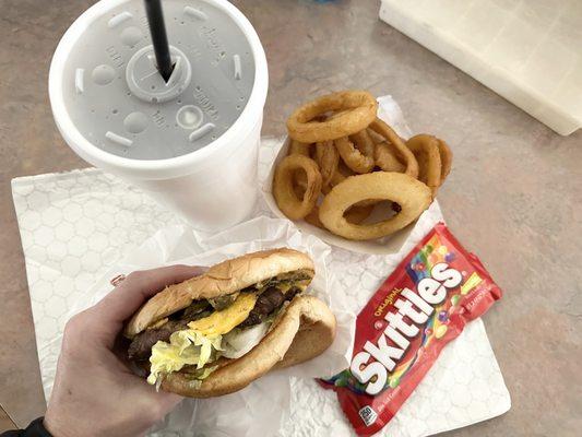 Green chile cheeseburger! Skittles were somethin' extra the Ma Brown's slipped in the takeout bag for my kids. Lol 2/2/2023