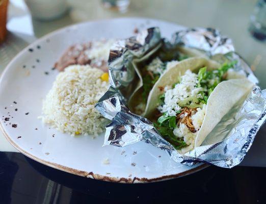 Ordered one of their lunch specials: two soft chicken tacos, rice and refried beans. Delicious and just enough food.