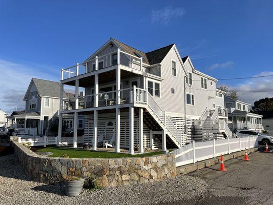 This is a home we lifted 10' and set on concrete piers we added all new decks many new windows and major interior remodeling