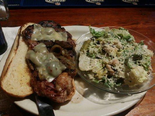 Ribeye steak sandwich, Tuesday night special, with Caesar salad