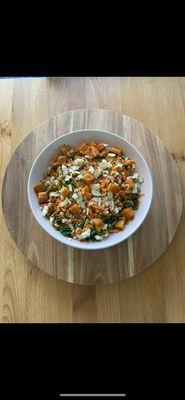 Thai salad- arugula kale quinoa almonds carrots sweet potatoes feta cheese  in peanut garlic dressing