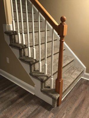 Hollywood style stairs with spindles installed by Michael Lincoln from Floors and Kitchens Today in Whitman MA