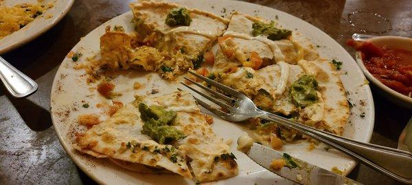 Half eaten chicken quesadilla