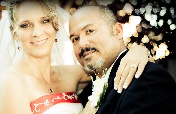 Bride and groom pose during their wedding ceremony in Las Vegas, Nevada