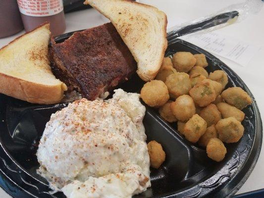 Rib plate with potato salad and okra