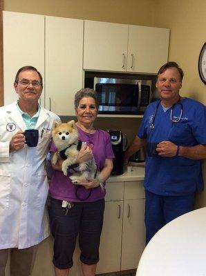 Dr. Robert Reynolds (l), client Carole Walker and her beautiful boy Thumper (m) and Dr. William Carlisle (r).