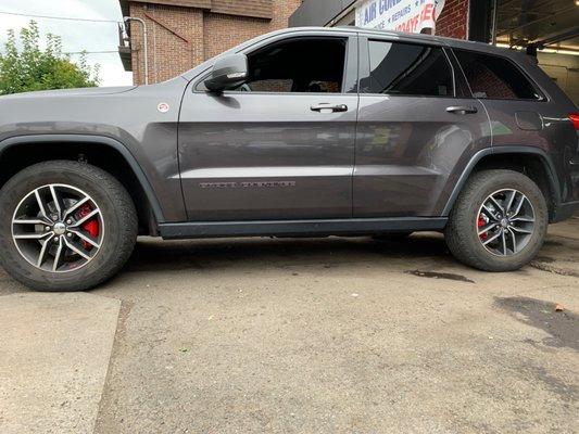 Red Caliper and Slotted Rotor kit install... Awesome job by Zach