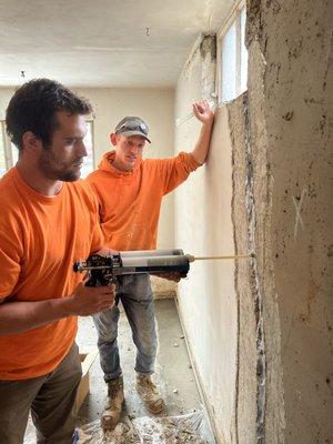 Polyurethane crack injection in foundation walls prevents water and pests from entering the basement.