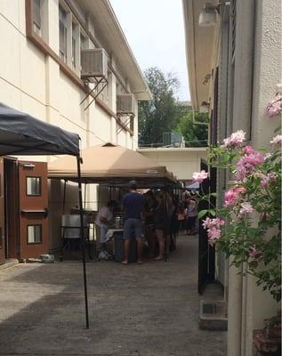 The tables are located in breezeway next to the church.