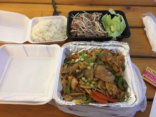 Pad Kee Mao (bottom) and Larb Gai (top) with steamed rice