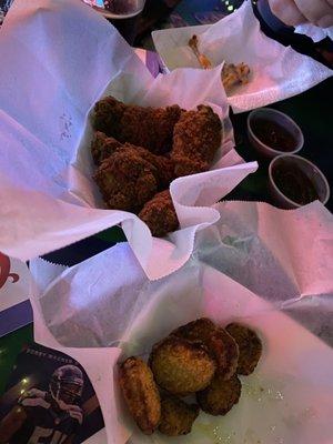 Deep fried pickles and wings, a little overdone