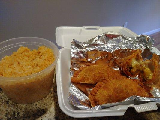 Beef, potato with cheese empanadas and Mexican rice