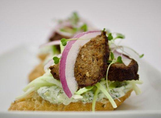 Partake Lounge
Lamb Gyro Crostini
round lamb, tzatziki sauce, shaved cabbage & red onion.