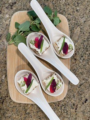 The chef's "Amuse Bouche" makes use of fresh-picked, edible flowers from the garden.