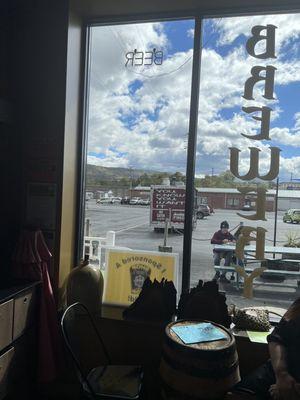 Food truck outside . Picnic tables outside to eat or bring inside.